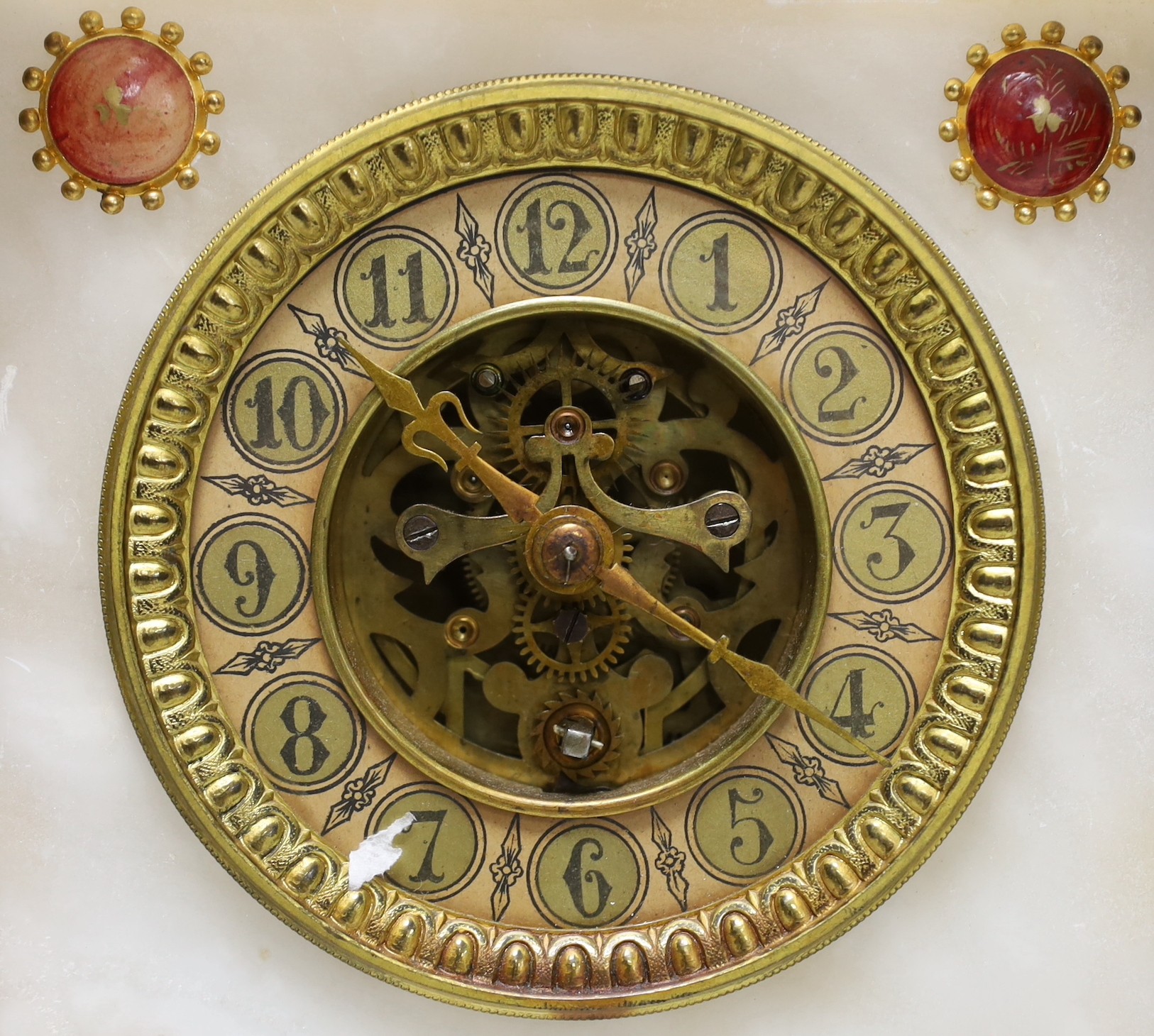 A French alabaster and gilt metal lion and ceramic mounted mantel clock, 34cm high
